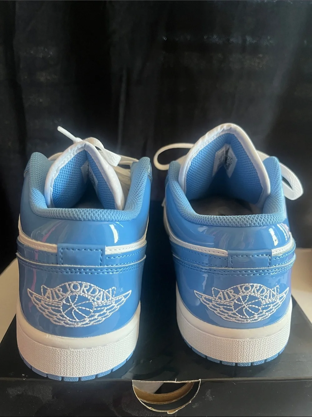 Air Jordan 1 Low SE Sneakers in White and Light Blue